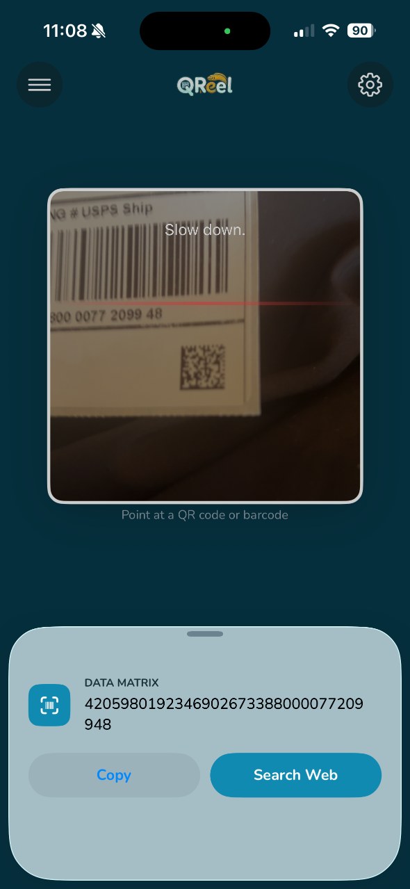 The QReel scanner reading a Data Matrix code on a shipping label